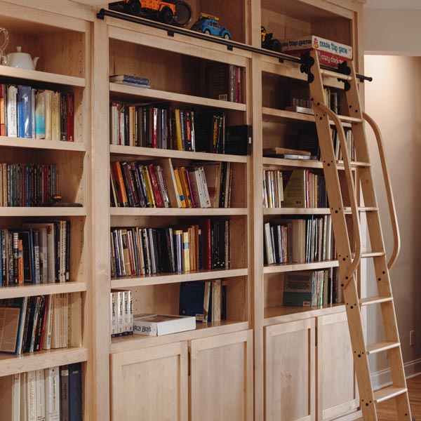 custom built in bookshelves with rolling ladder